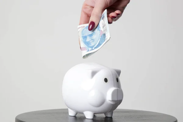 Hand Putting Turkish Lira Piggy Bank — Stock Photo, Image