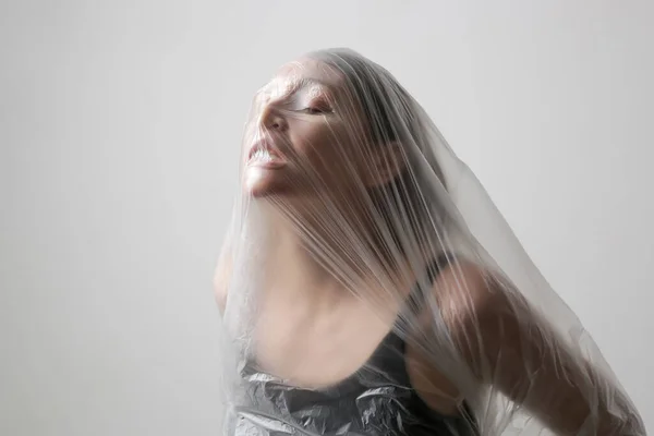 Woman Wrapped Plastic Sheet Studio Shot Woman Mental Health Concept — Stock Photo, Image