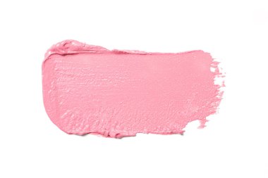 Beyaz arka planda pembe renkli makyaj örneği var. Dekoratif kozmetik leke.