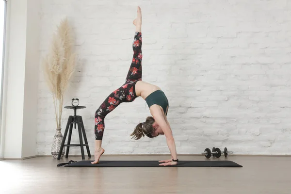 Young Woman Practicing Strength Yoga Positions Wellbeing Self Care Concept — Zdjęcie stockowe