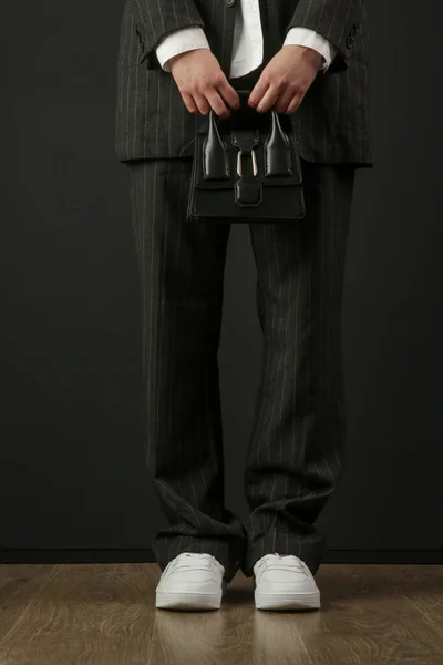 Fashionable Trendy Woman Holding Top Handle Mini Black Bag Studio — Fotografia de Stock
