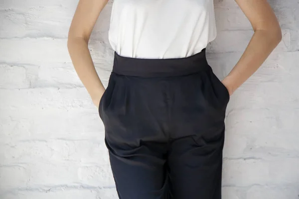 Female Model Wearing White Camisole Cotton Top Black Trousers Classic — 스톡 사진