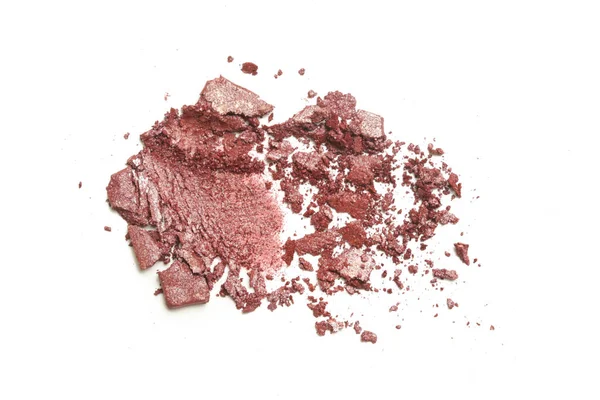 Parçalanmış kahverengi makyaj örneği beyaz arkaplanda izole edilmiş.