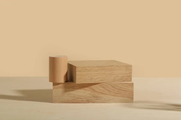 Minimalist wooden scene. Abstract minimal empty stage with rectangle podiums on beige background. Mockups display for product presentation.