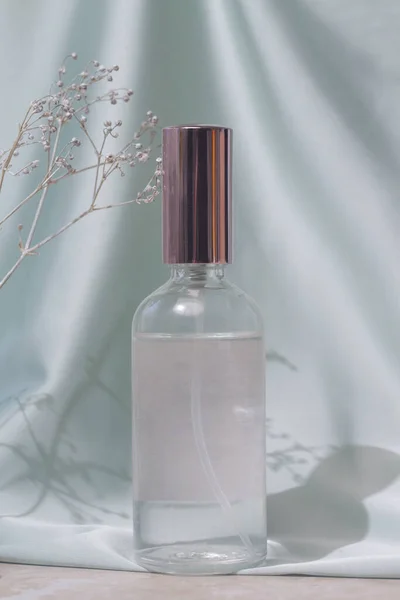 Glass Translucent Spray Bottle Soft Folded Silk Background Luxury Cosmetic — ストック写真