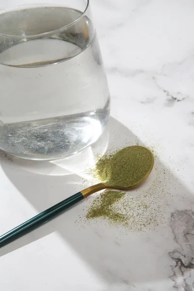 Green Powder Spoon Glass Water Concept Nutritional Supplement Dieting Detox — Foto de Stock