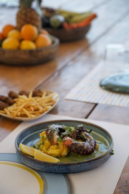 Various Mediterranean dishes served on the restaurant table