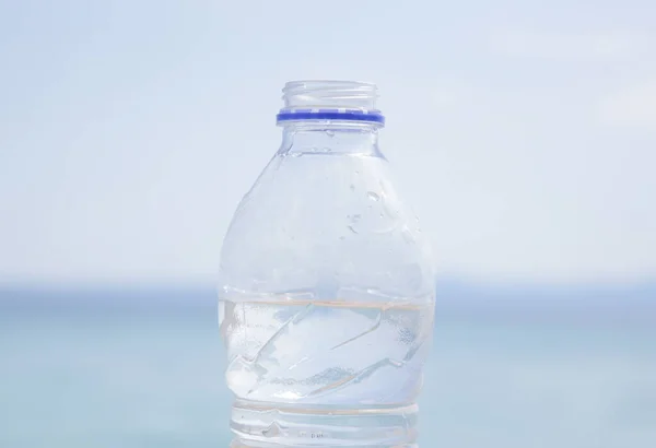 Plastic Water Bottle Blue Sky Sea Background — Stockfoto