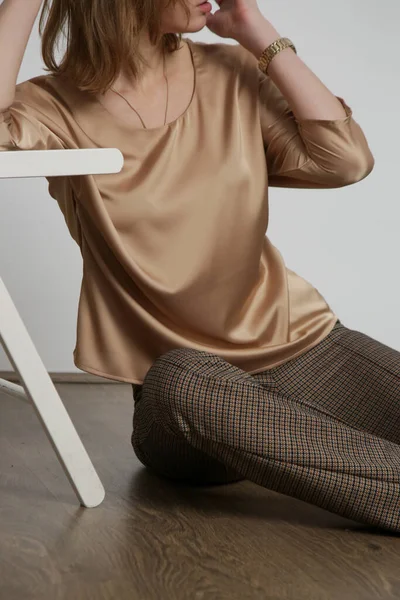Young Female Model Wearing Cream Silk Satin Blouse Brown Trousers — 스톡 사진
