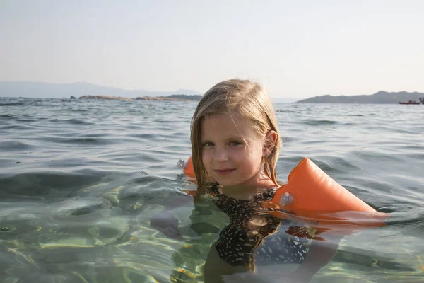 Candid Close Portrait Years Old Girl Swimming Inflatable Swim Arm — Stock Photo, Image