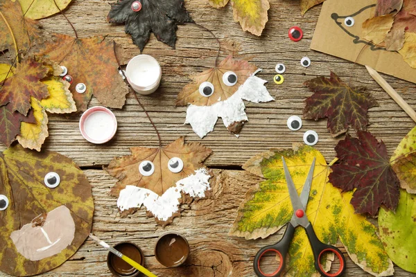 Crafts with autumn leaves. Maple leaf foxes.