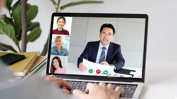 Video conference, Work from home, Asian man and woman making video call to business team with virtual web, Contacting asia colleagues group by conference on laptop computer at home, Coworker talking on web, Online consultation business