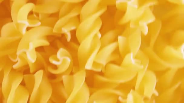 Uncooked Fusilli Pasta, Dry Spiral Macaroni - Moving Background — Stock Video