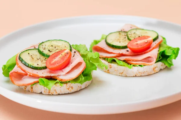 Rice Cakes with Ham, Tomato, Cucumber and Green Salad