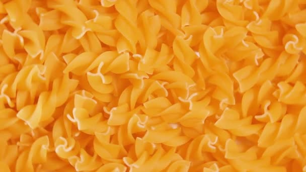 Uncooked Fusilli Pasta, Dry Spiral Macaroni Background Rotation — Stock Video