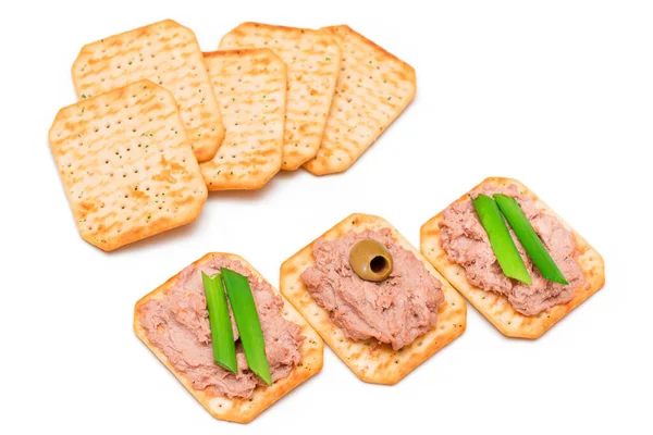 Crispy Salted Crackers with Liver Pate, Green Onions and Olives — Stock Photo, Image