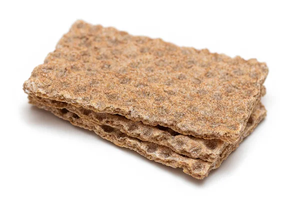 Crujiente conjunto de pan de grano entero aislado en blanco — Foto de Stock