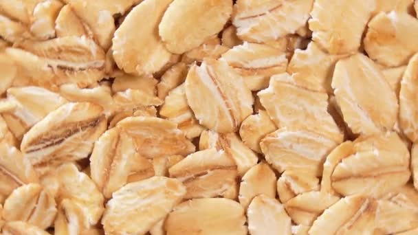 Oat Flakes Background Rotating Left Top View Close Scattered Dry — Vídeo de Stock