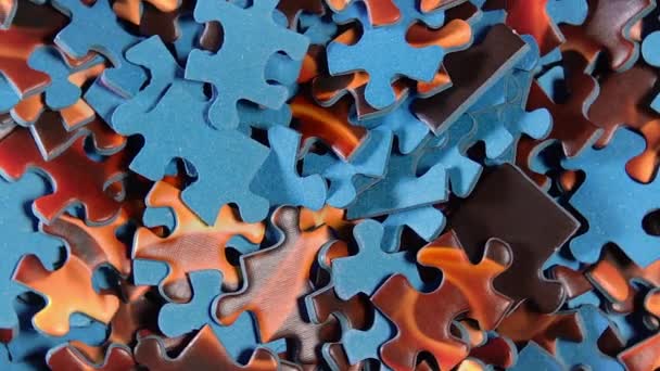 Background Colored Puzzle Pieces Slowly Rotating Clockwise Top View Close — Video Stock