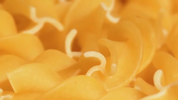 Uncooked Fusilli Pasta Rotating Macro Fat Unhealthy Food Dry Spiral — Video