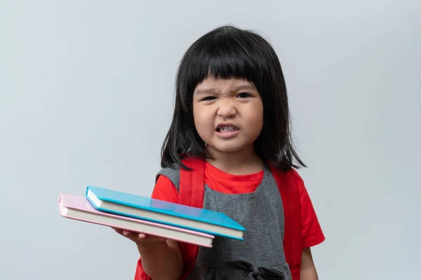 Happy Asian Little Preschool Girl Wearing Red Glasses Holding Books — стоковое фото