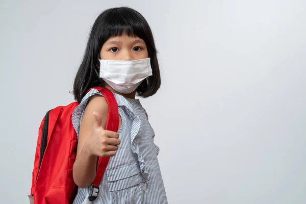 Portrait Asian Girl Kid Protective Face Mask School Backpack Thumbs — стокове фото