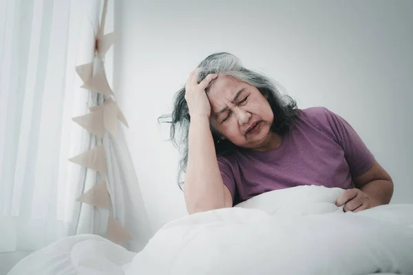Unhealthy Elderly Senior Asian Woman Sitting Bed Suffering Headache Migraine — 스톡 사진