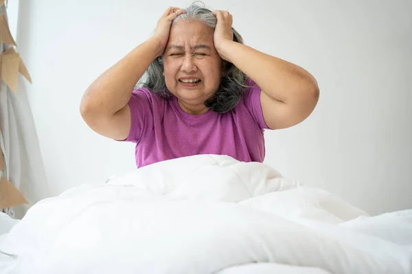 Unhealthy Elderly Senior Asian Woman Sitting Bed Suffering Headache Migraine —  Fotos de Stock