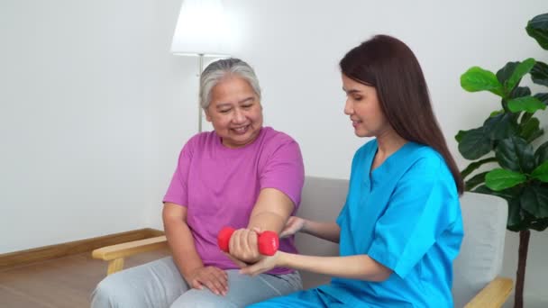 Asian Caregiver Nurse Doing Physical Therapy Assistance Support Teach Body — Vídeo de Stock