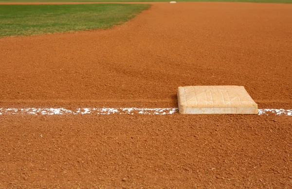 Dziedzinie baseballu w pierwszej bazy — Zdjęcie stockowe