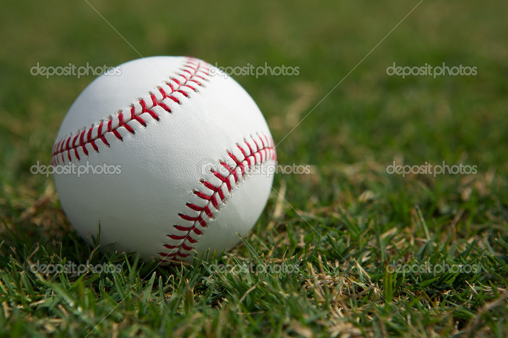 Baseball in the Outfield Grass Stock Photo by ©33ft 19677571