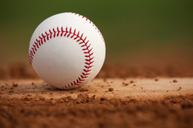 Close Up Baseball on the Pitchers Mound clipart