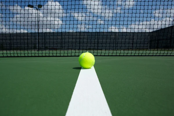 Tennis Ball on the Court near the Net — Stock Photo, Image
