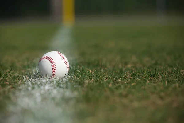 Baseball on the Outfield Chalk Line — Stock Photo, Image