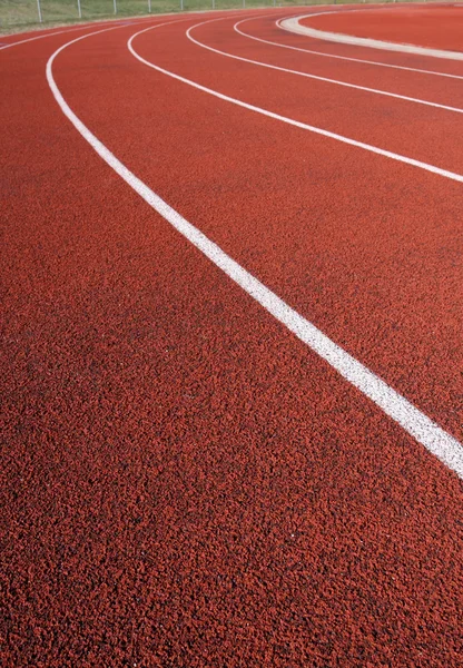 Křivka červená běžecké dráhy — Stock fotografie