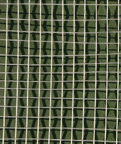 Tenis raketi dizeleri — Stok fotoğraf