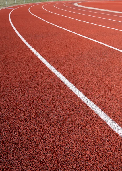 빨간 육상 트랙의 곡선 — 스톡 사진