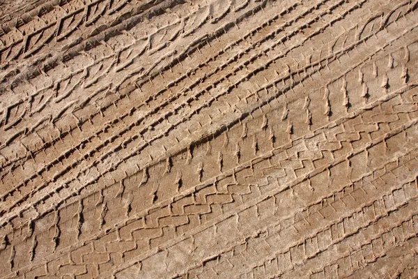 Tire tracks in the sand — Stock Photo, Image