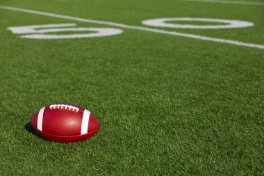 elli yakınındaki sahada Amerikan futbolu