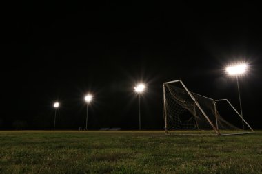 Geceleri yanan alan eski grunge futbol gol