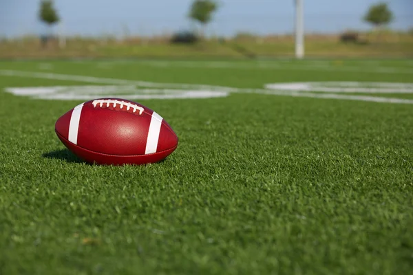 American Football on the Field near the Fifty — Stock Photo, Image