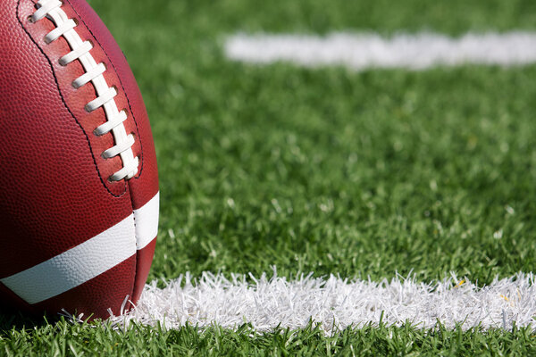 Американский футбол рядом с хешмарками
