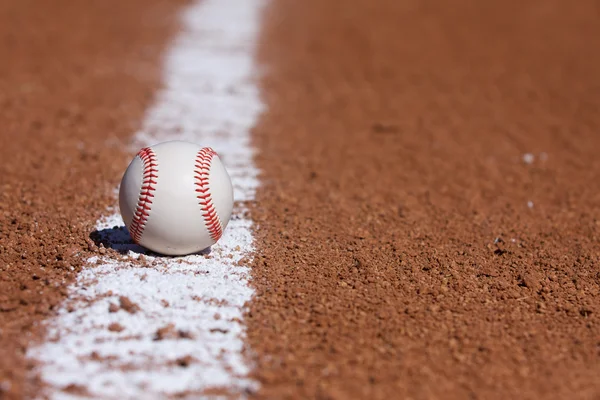Baseball on the Infield Chalk Line — Stock Photo, Image