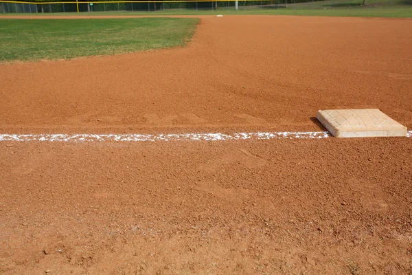 Baseball területen első bázison — Stock Fotó