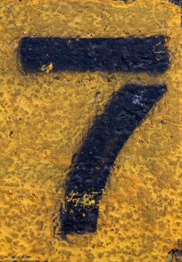 Number Seven on Painted Asphalt