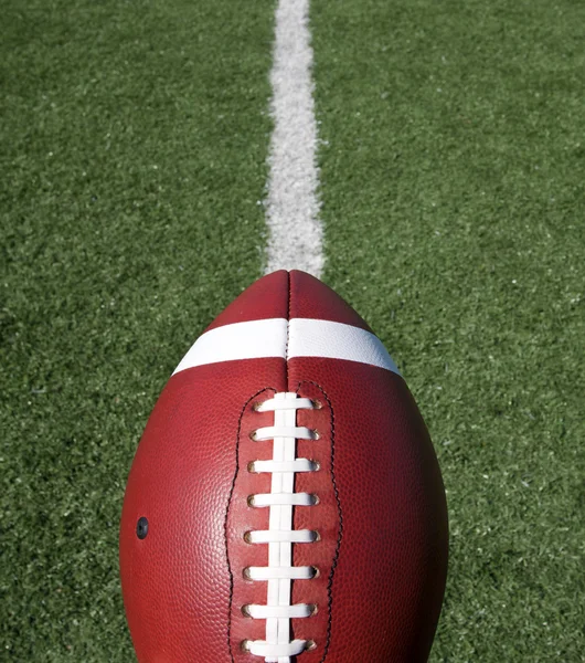 Football with Field Beyond — Stock Photo, Image
