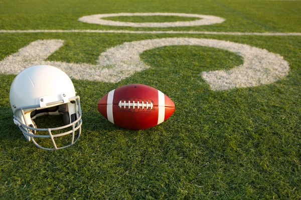 American football and helmet — Stock Photo, Image