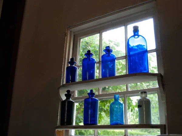 Bottles Apothecary Window Лицензионные Стоковые Фото