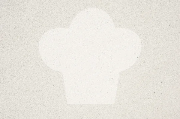 Cook icon on sand background and textured — Stock Photo, Image