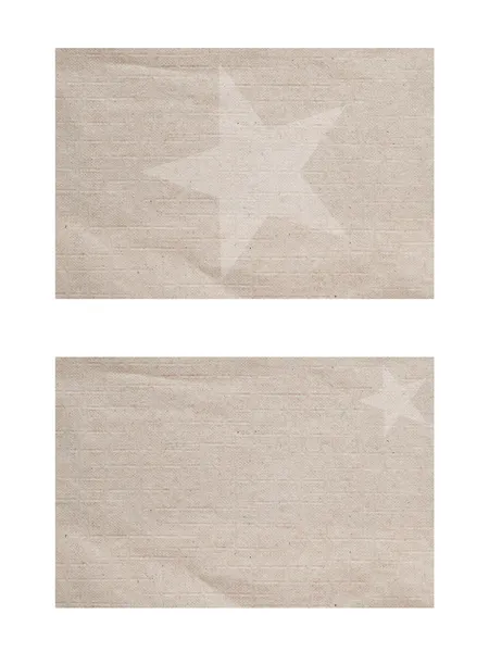 Ícone de estrela em fundo de papel e texturizado — Fotografia de Stock